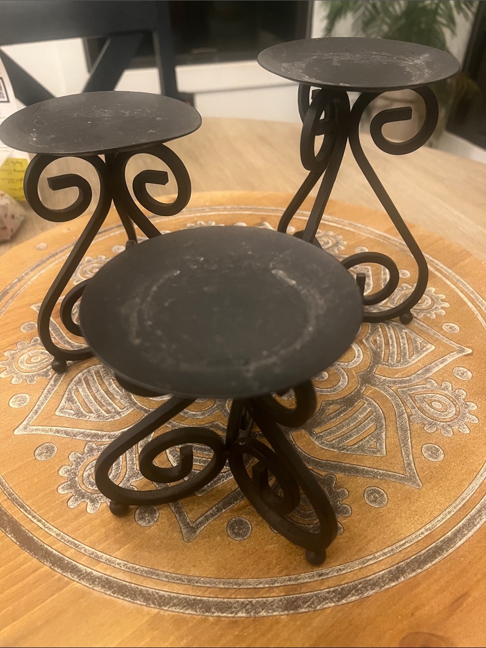 Black graduated heights wrought iron candle holders. Set of 3.